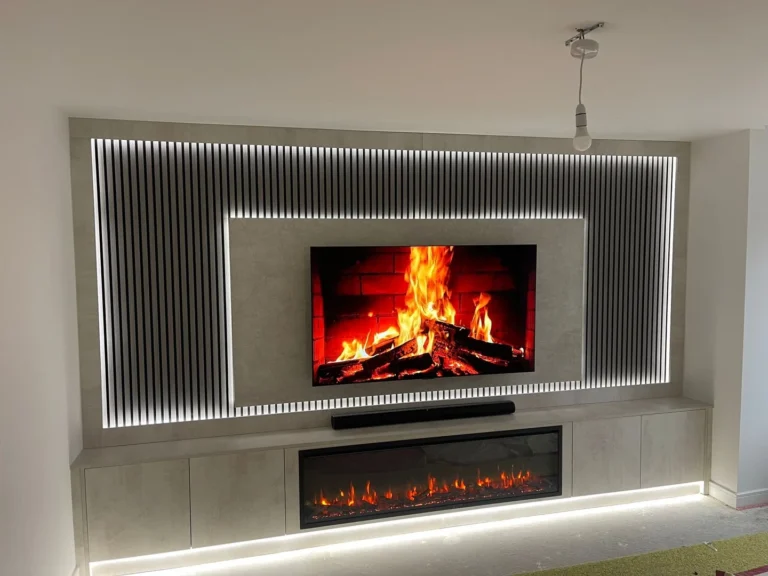 Media wall with built-in electric fire, slatted panels and LED lighting